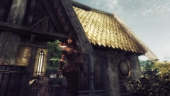 Erinaari in front of her shack